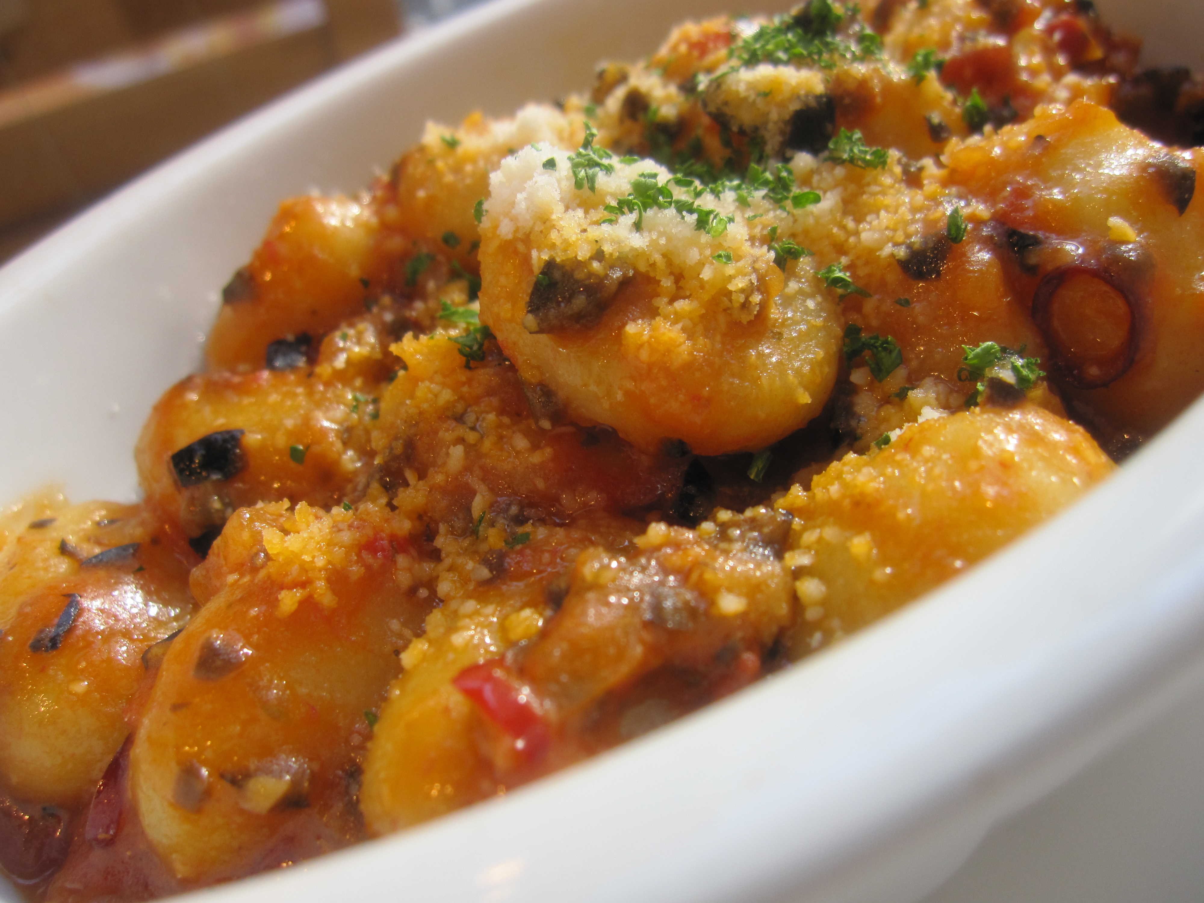 Gnocchi with black olive and tomato